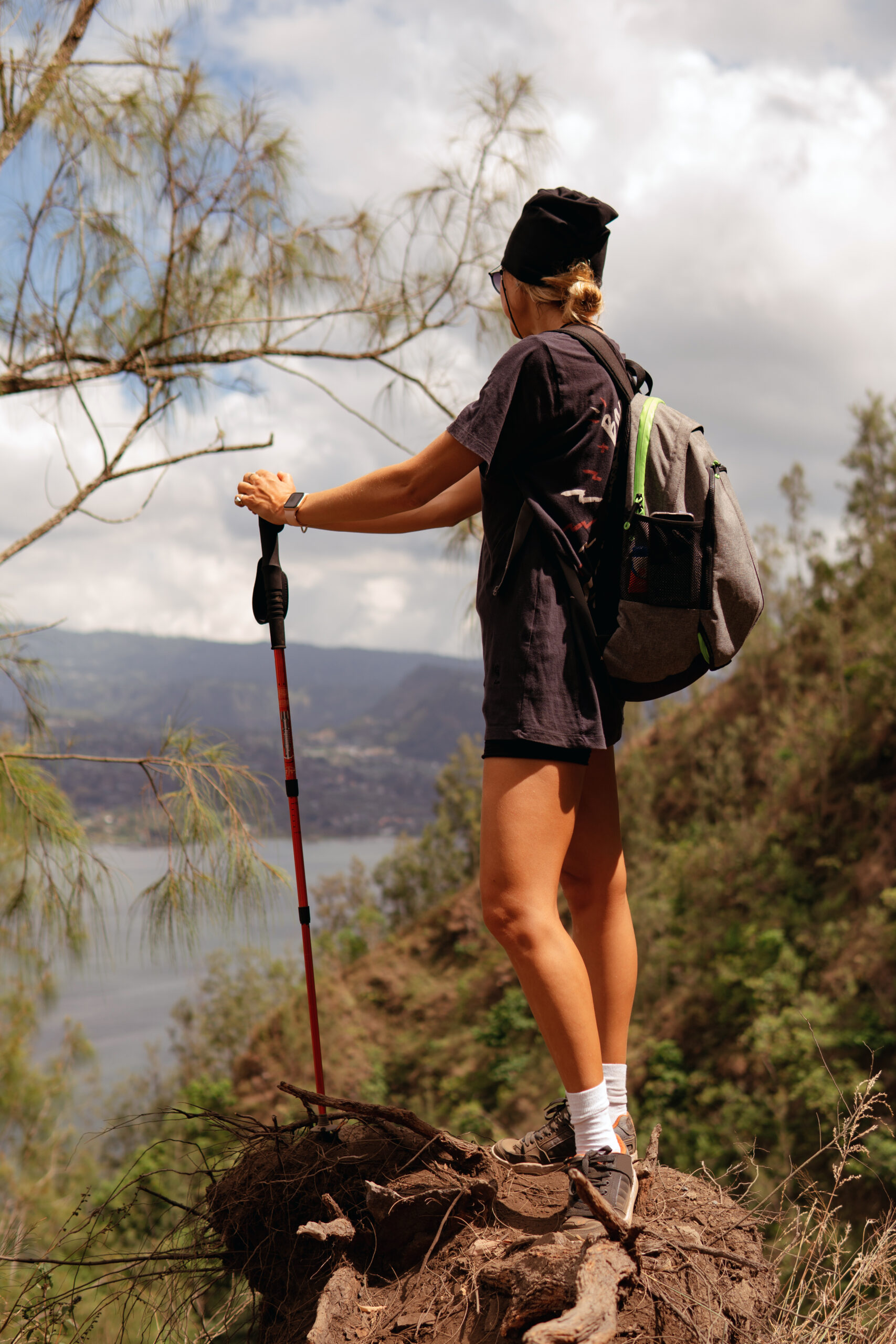 Woman hiking above a lake in Bali